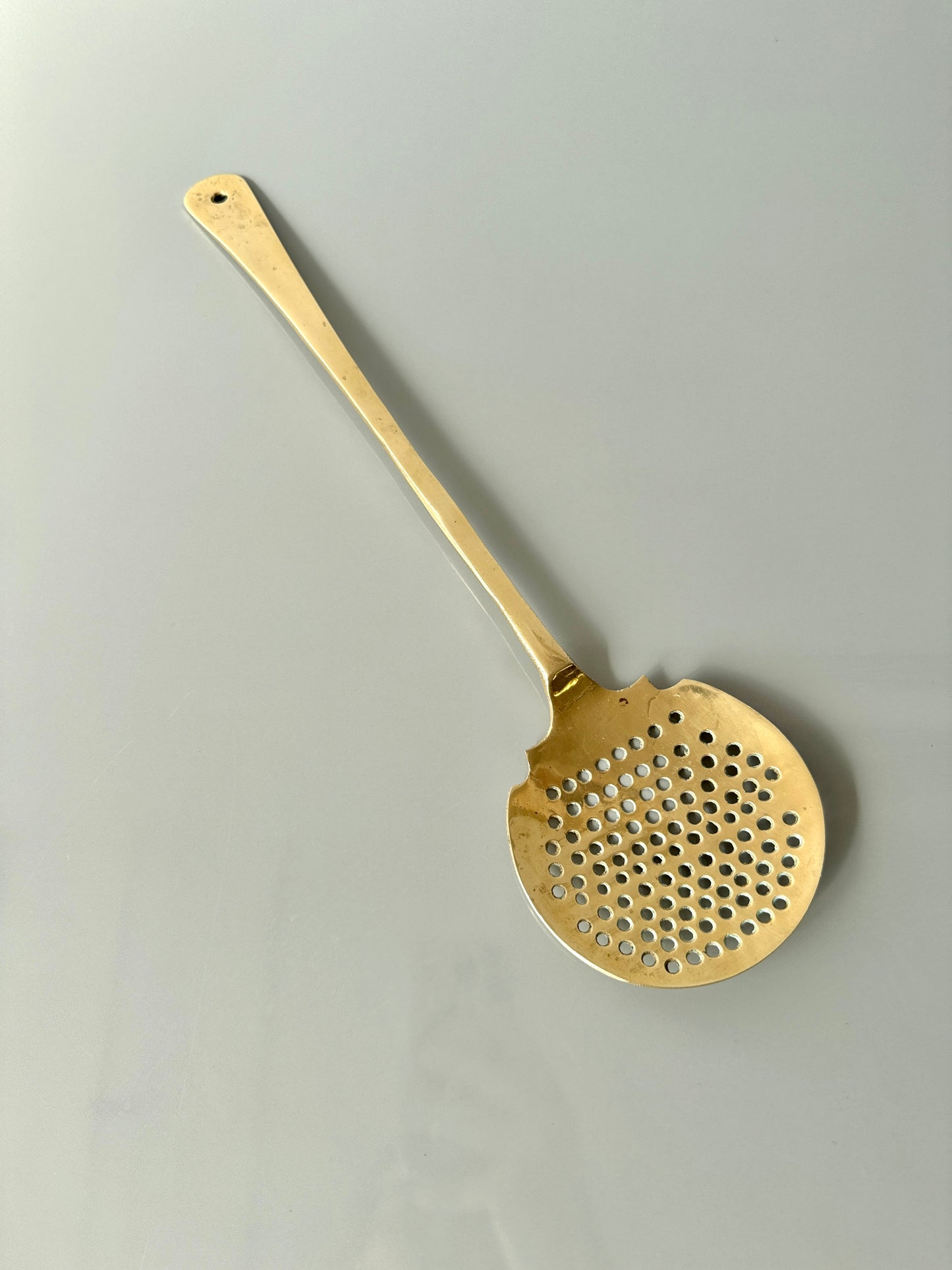 Large Vintage Slotted Brass Spoon